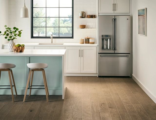 bright kitchen with brown hardwood floor from Katy Carpets in Katy, TX